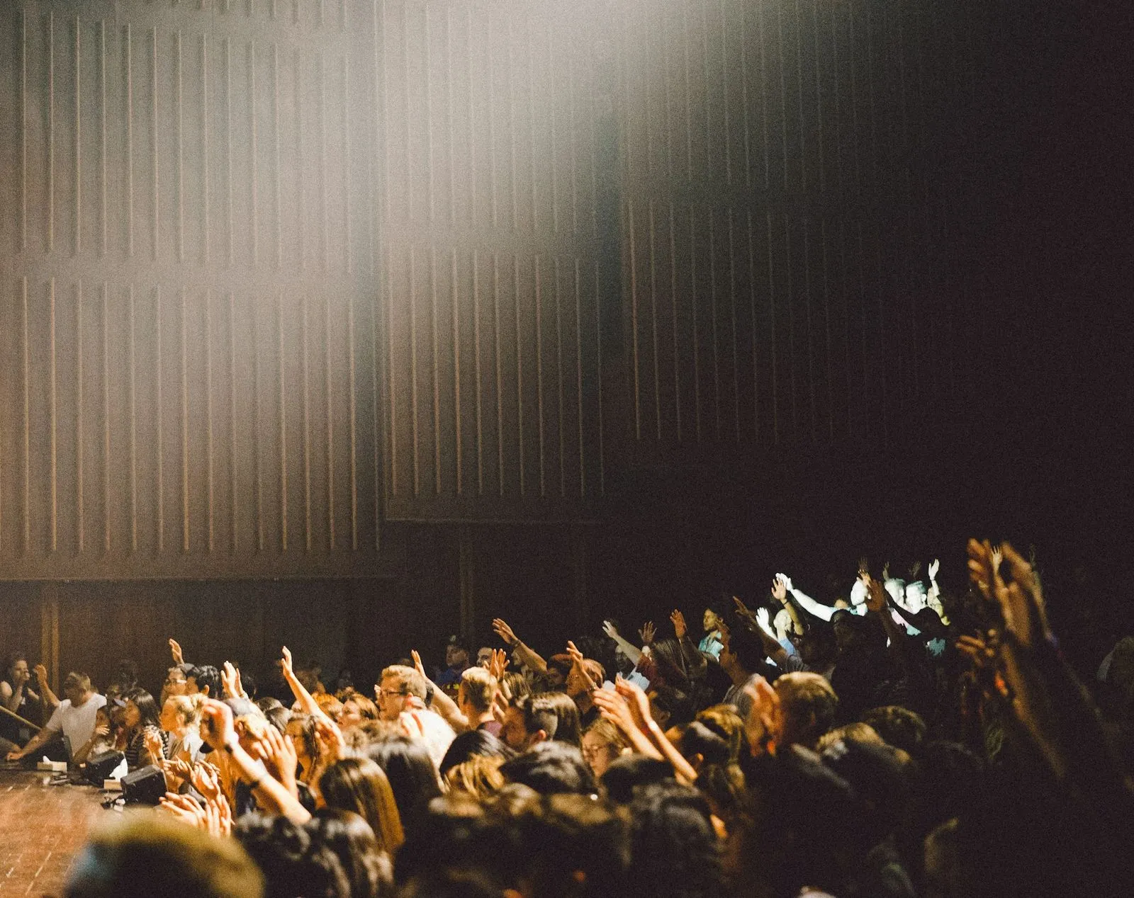 A crowd at a speaking event